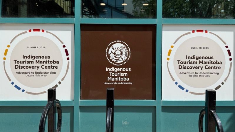 A exterior photo of the Indigenous Tourism Manitoba signage.